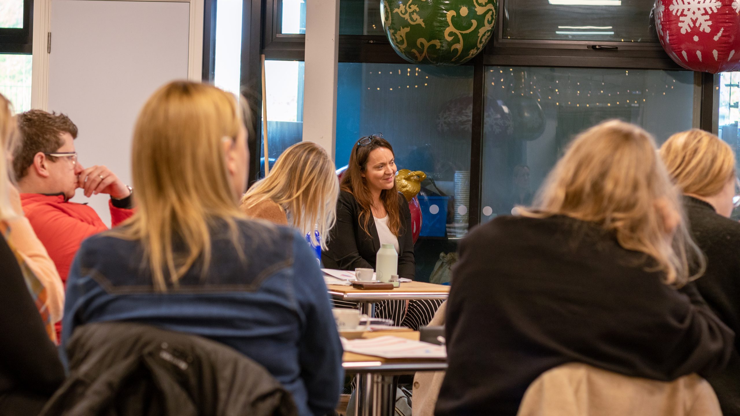 People gathered in conversation at a Growing Together workshop